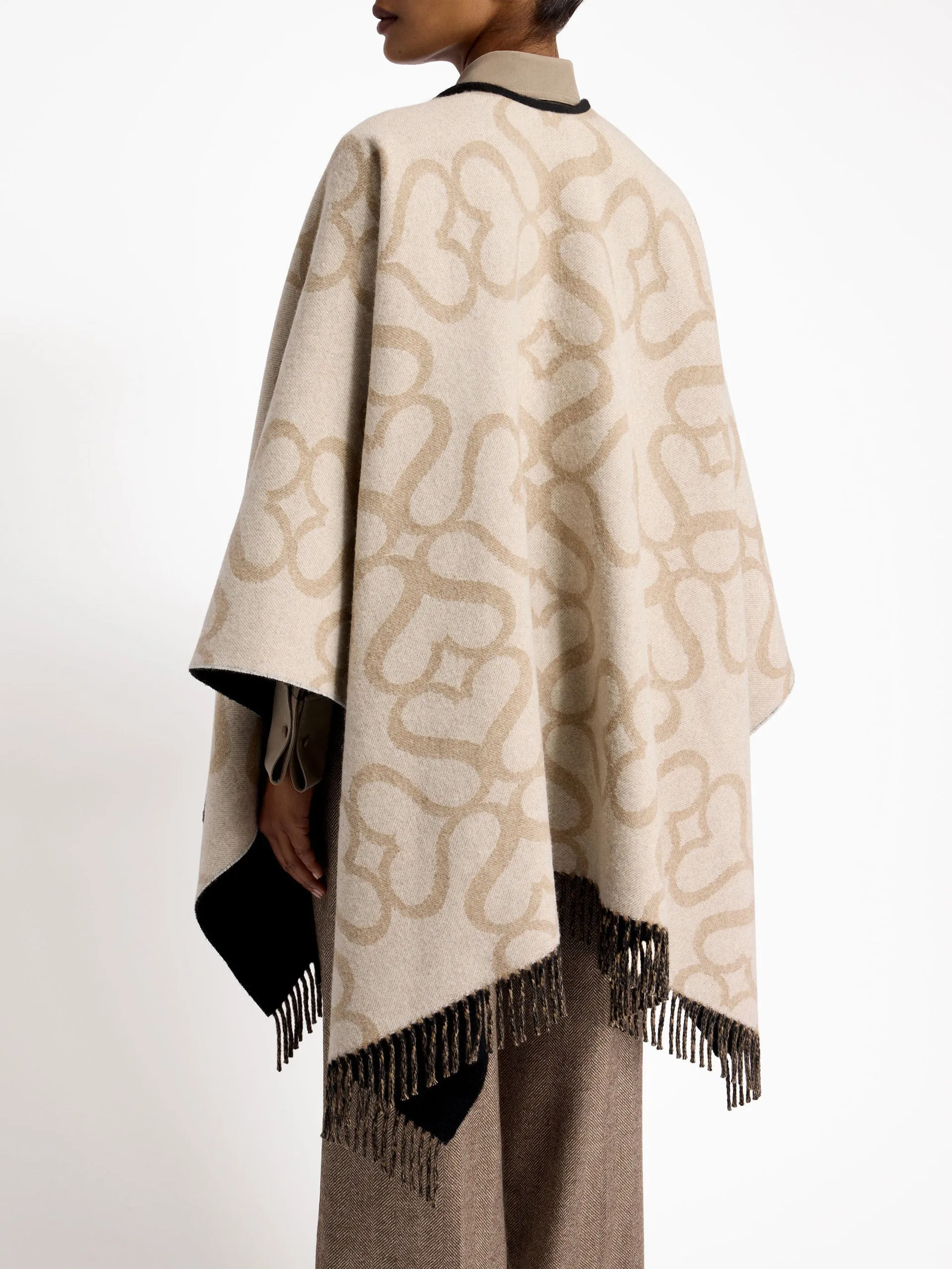 Black, camel, and vanilla monogram reversible cape